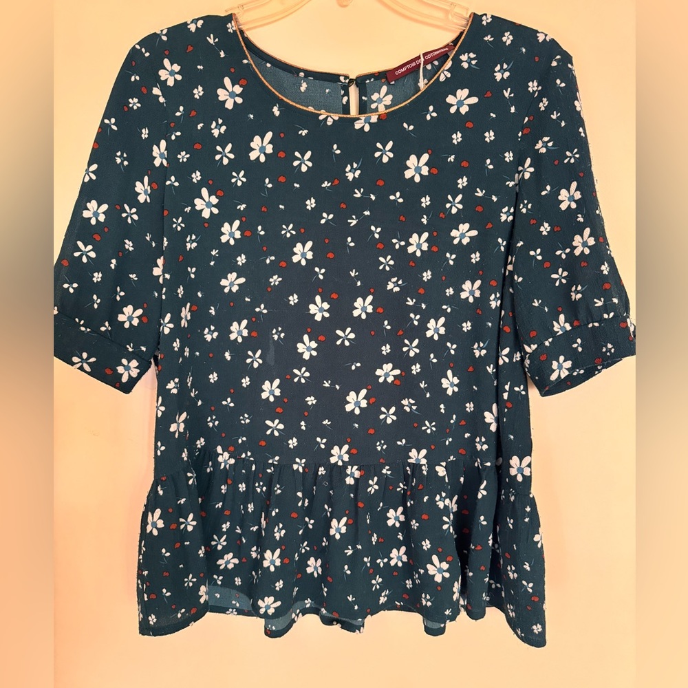 Super cute short sleeve blouse with peplum bottom